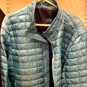 Turquoise North Face synthetic down winter coat